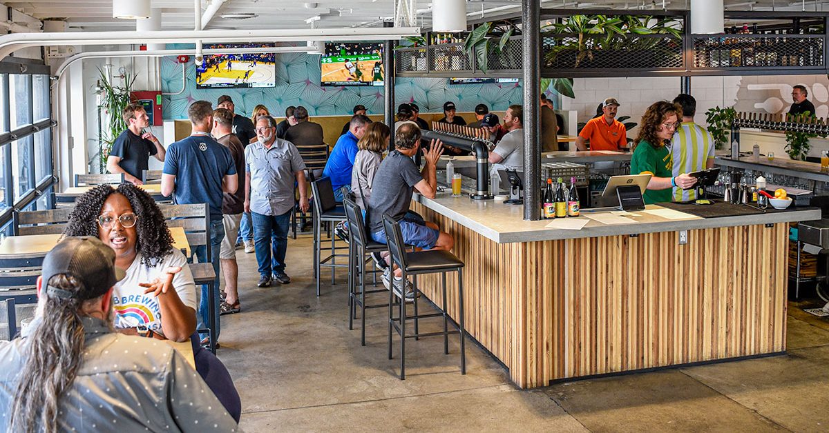 beer drinkers enjoying brewery taproom
