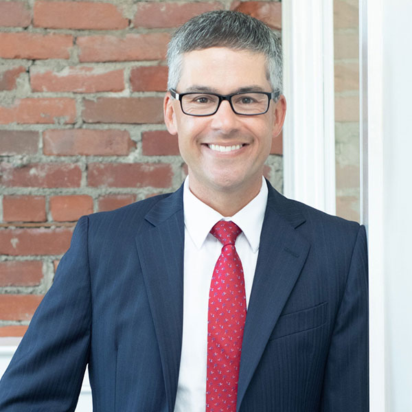 eric orlando headshot for defense of the industry award