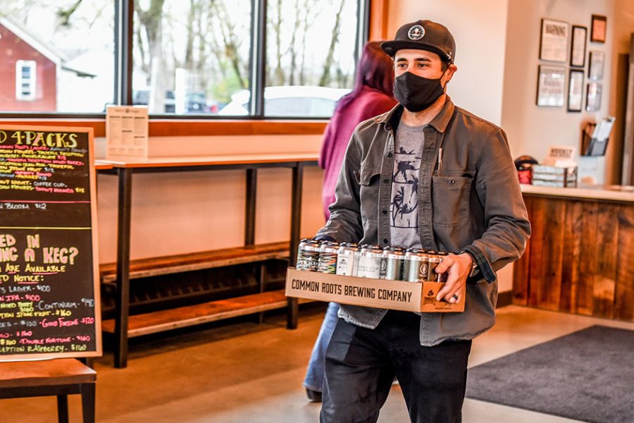 man leaving with to go beer 1200x628 1
